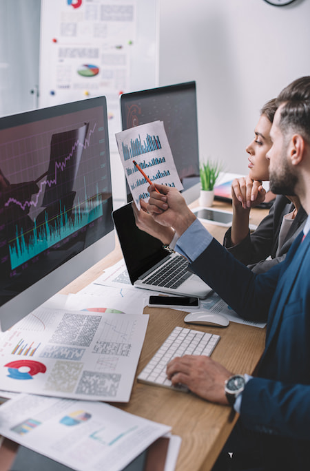 Team of data analysts reviewing data