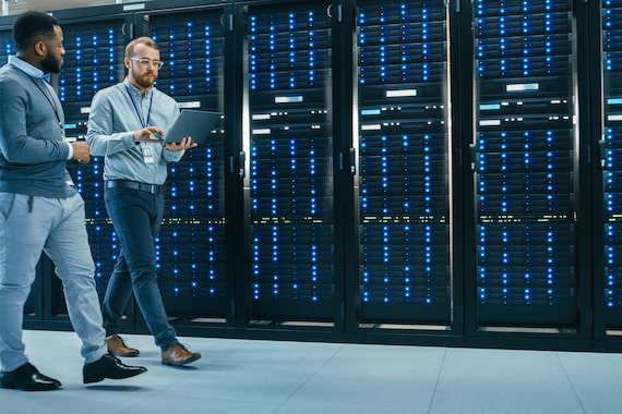 Two engineers inspecting partner cloud service providers